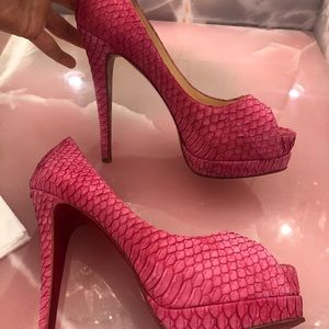 CHRISTIAN LOUBOUTIN
Python Animal Print Pumps